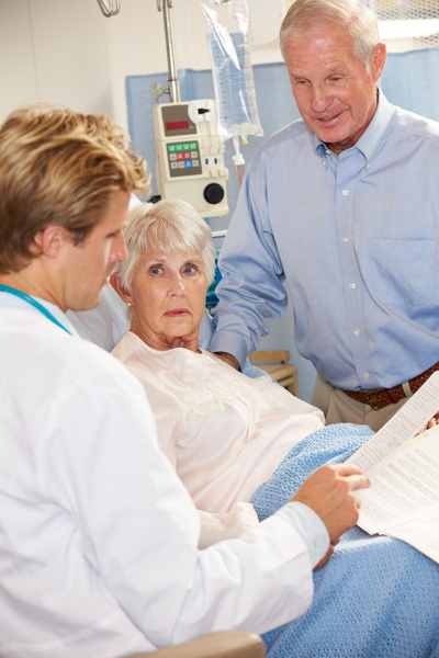 Patient receiving news that a surgical error occurred during her surgery.